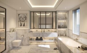 Elegant marble bathroom in a Seaside Plaza Monaco apartment with bathtub, vanity and built-in shelving