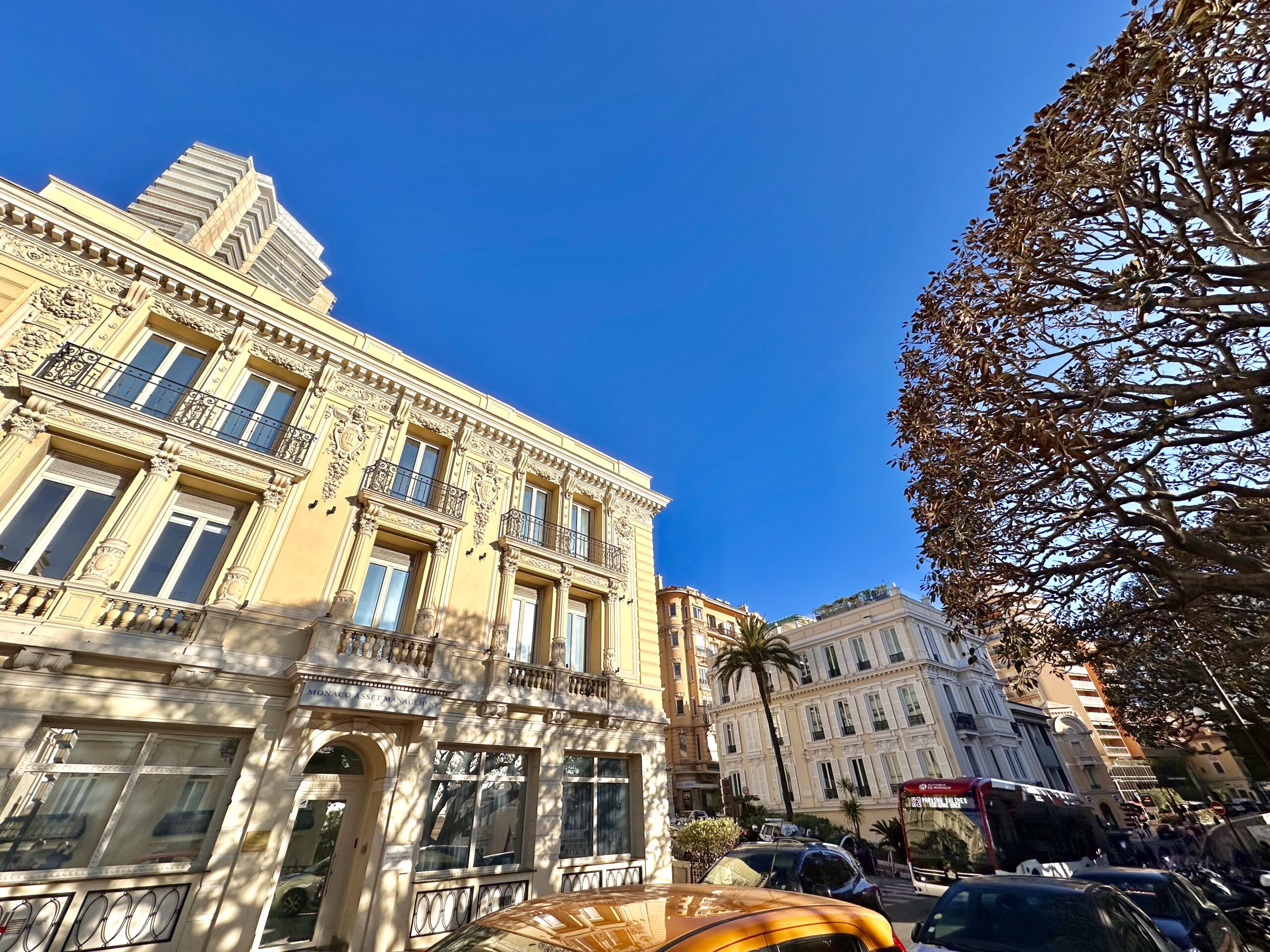 Boulevard Princesse Charlotte and mutiple bourgeois buildings on a sunny day