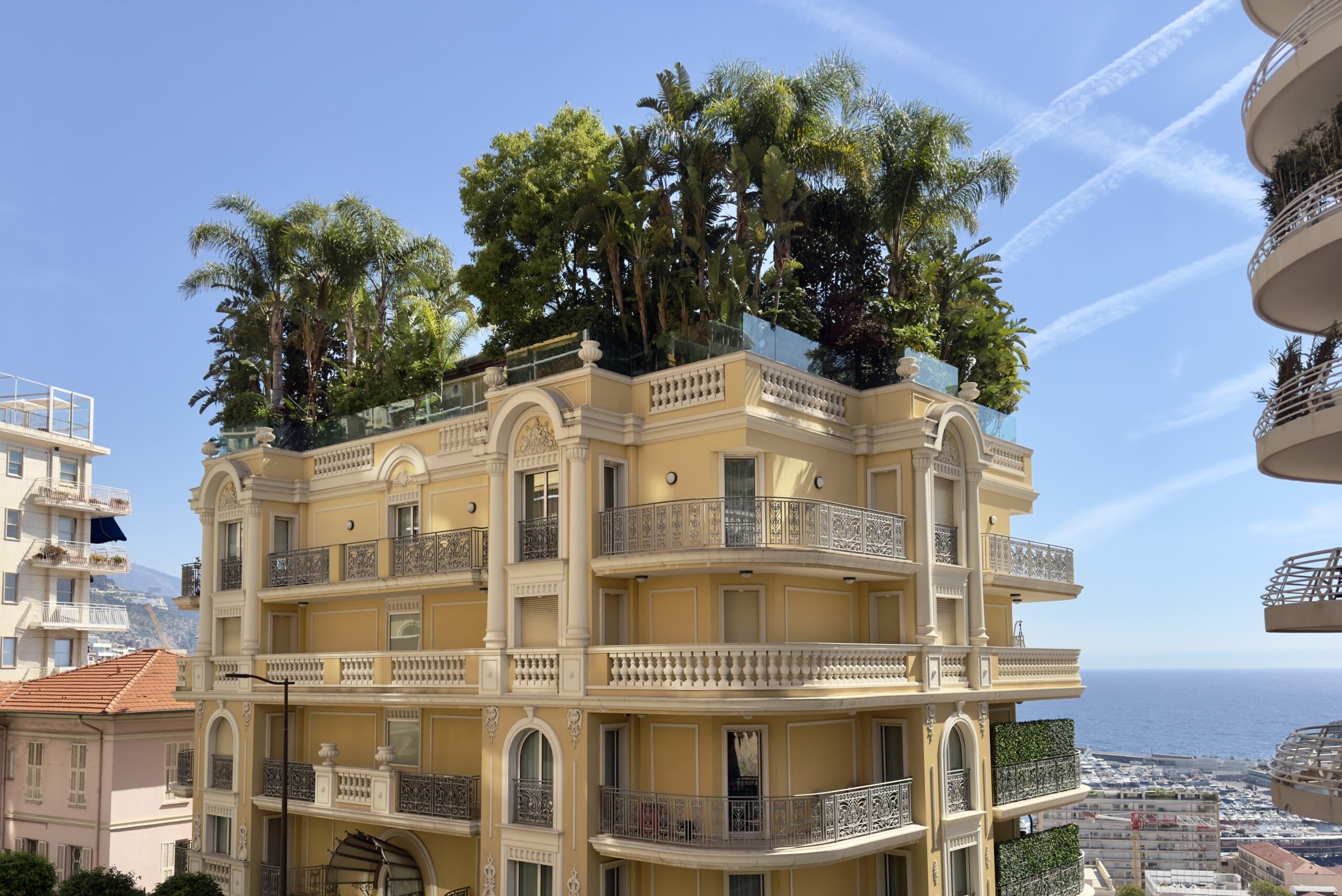 Oiseau Bleu pictured from the outside, sea and monaco behind