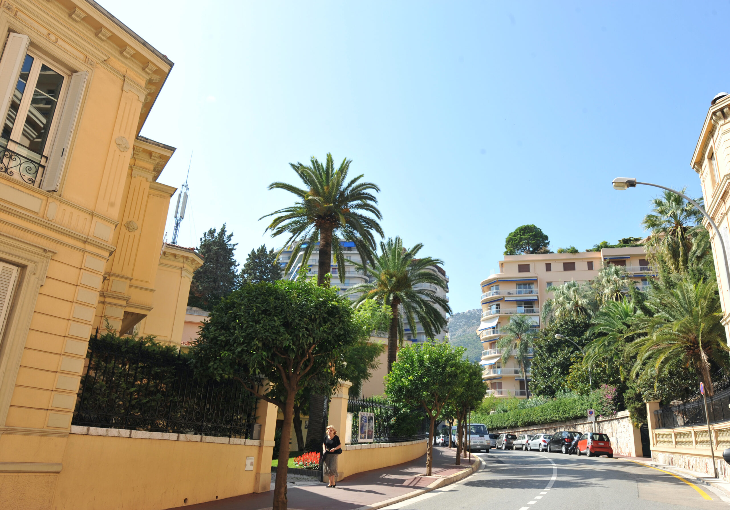 Residential street in Monte-Carlo Monaco with Belle Époque villas and apartment buildings for sale and rent