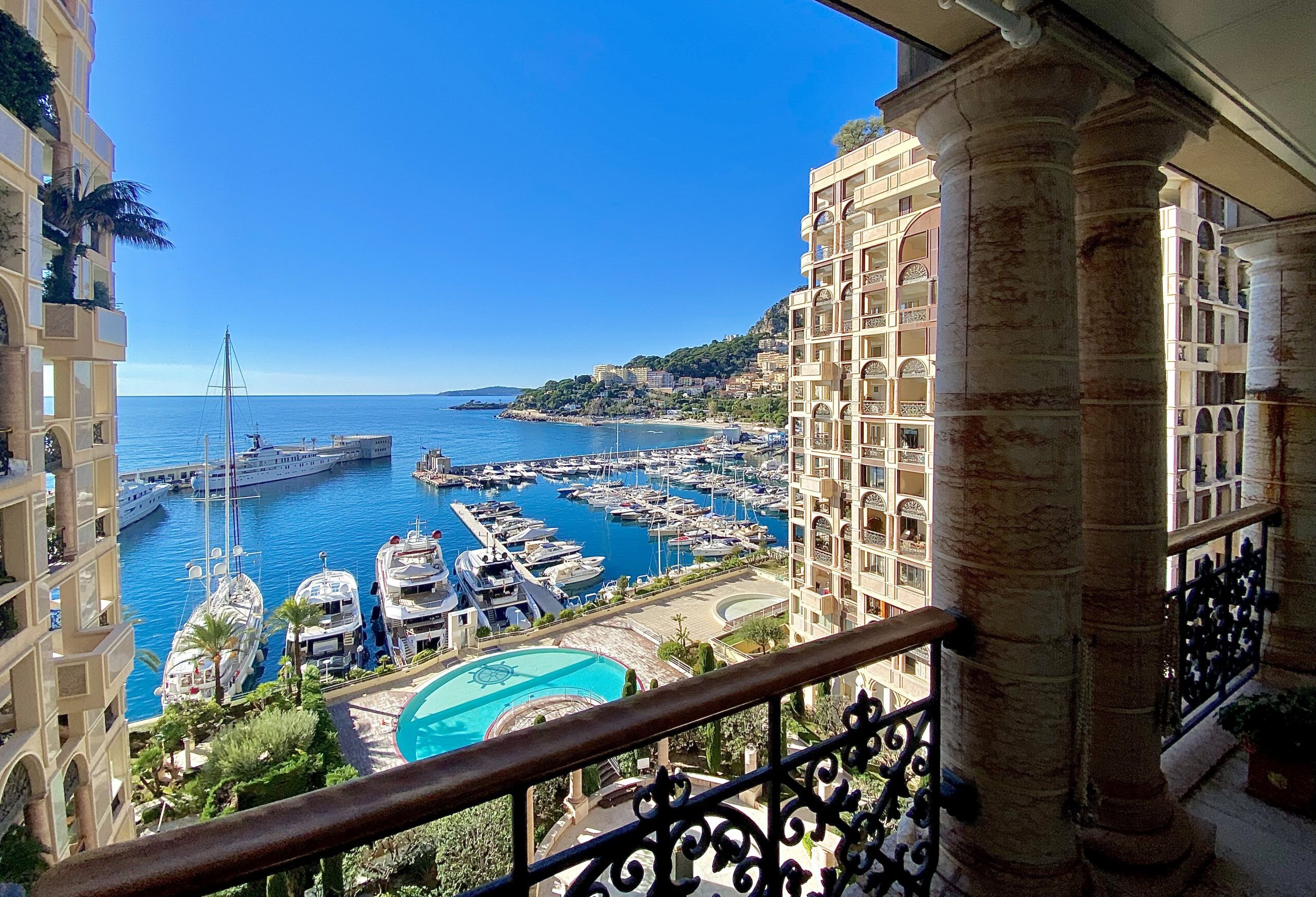 View from a Seaside Plaza Monaco terrace overlooking Fontvieille Marina, yachts and the Mediterranean Sea