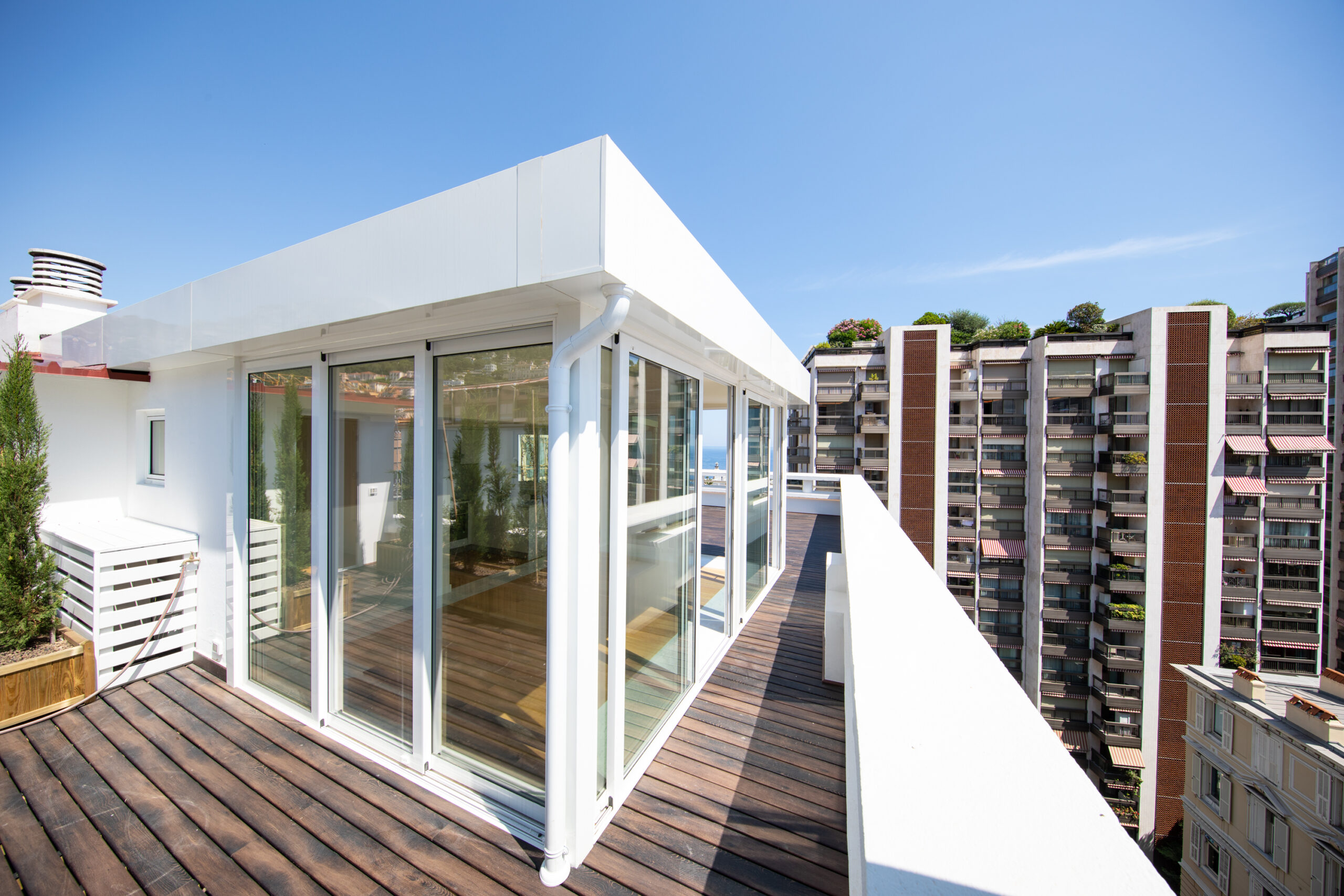 Villa Europe penthouse rooftop terrace with glass extension and panoramic views over Monaco, luxury penthouse for sale in Monaco