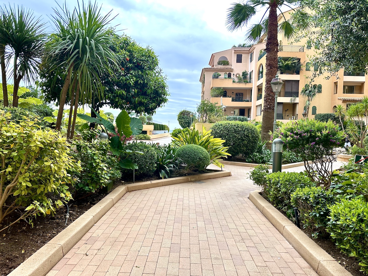 Cyclades garden and entrance to the building