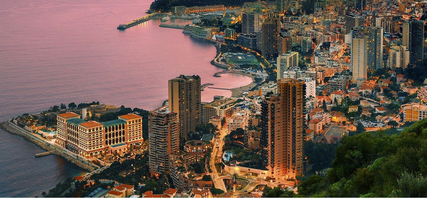 Larvotto coastline with Monte-Carlo Bay Hotel Monaco at sunset