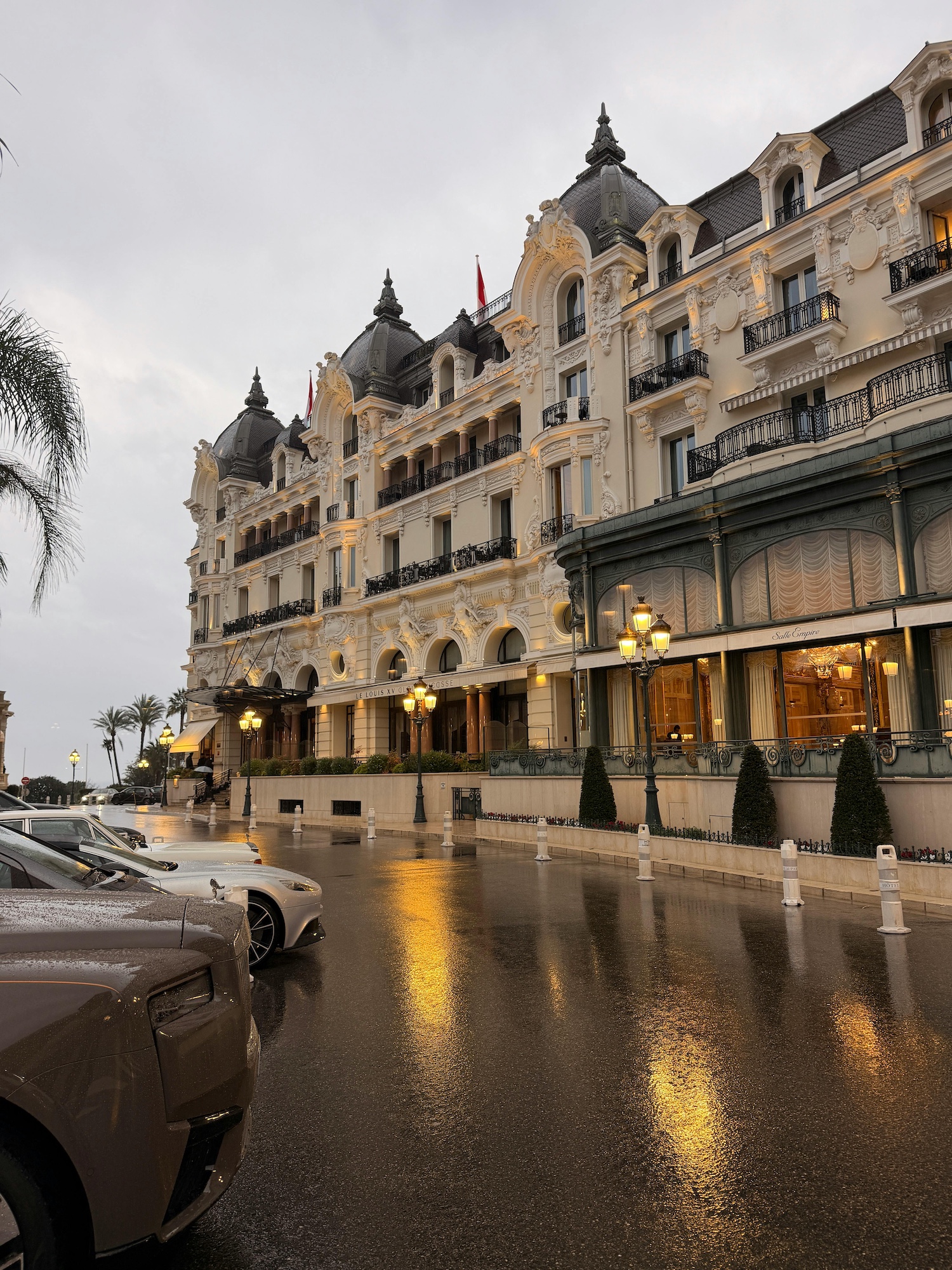 Hotel de Paris Monte-Carlo iconic Belle Époque facade at night in the heart of Monaco, surrounded by luxury apartments and properties for sale and rent in Monte-Carlo