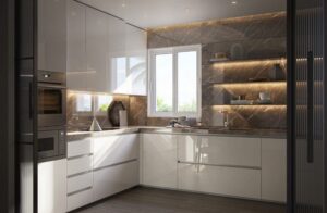 Kitchen at Villa Annonciade Monaco with gloss white units and dark marble splashback.