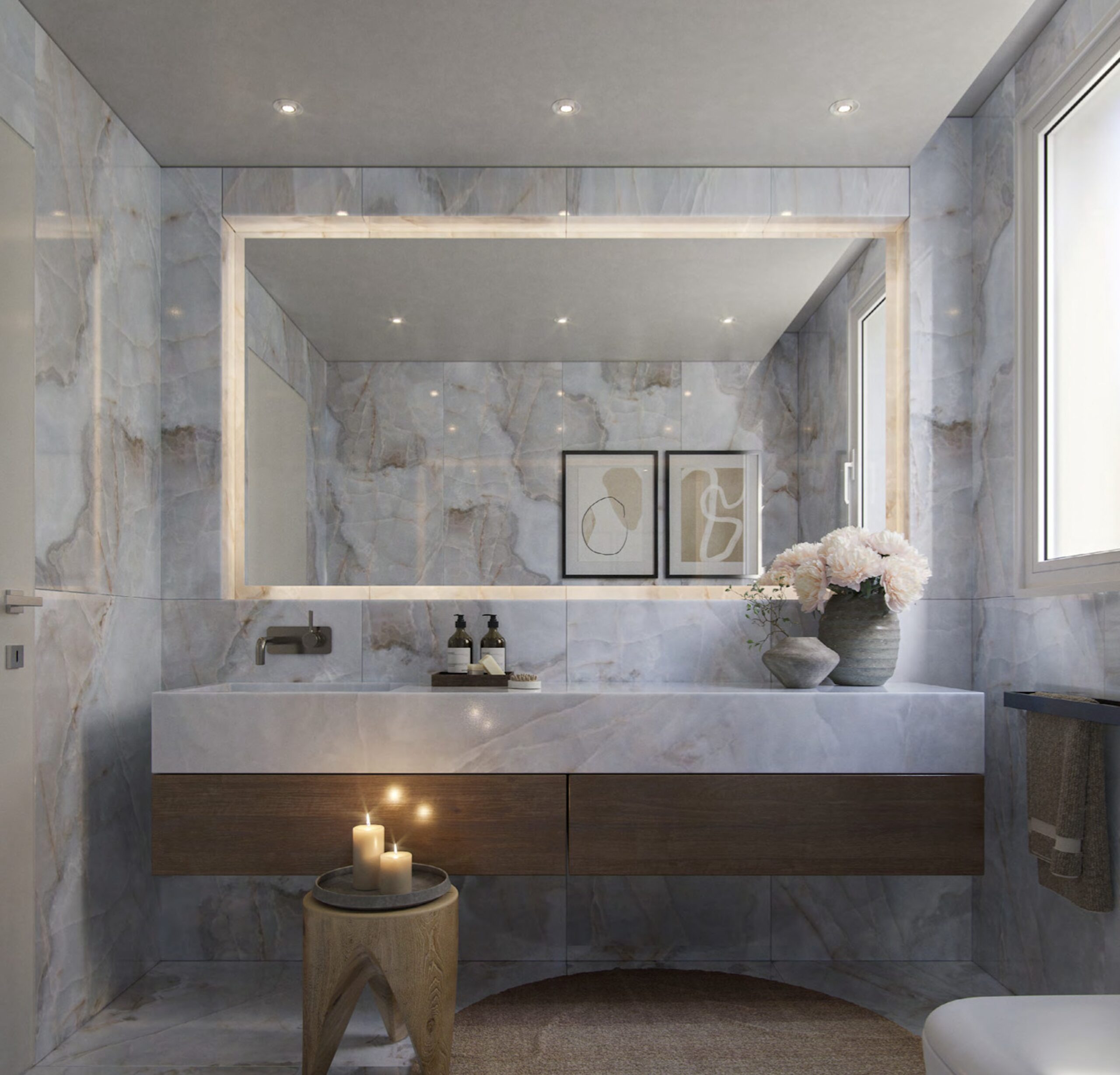 Blue marble bathroom at Villa Annonciade Monaco with floating vanity and backlit mirror