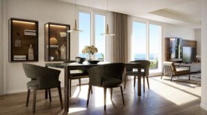 Open plan dining room at Villa Annonciade Monaco with pendant lights and sea view windows
