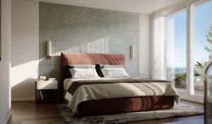 Bedroom at Villa Annonciade Monaco with terracotta headboard and glazed sea view terrace