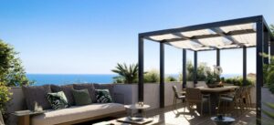 Rooftop terrace at Villa Annonciade Monaco with pergola dining area and open sea view
